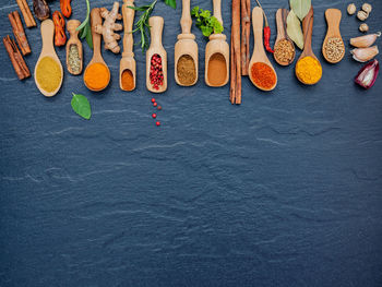 High angle view of spices on slate