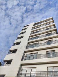Low angle view of modern building against sky