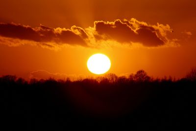 Scenic view of sunset over landscape