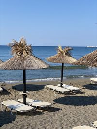 Scenic view of beach against clear sky