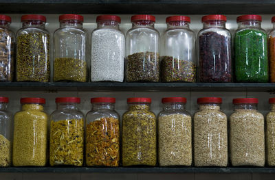 Variety of food in jar on shelves at store