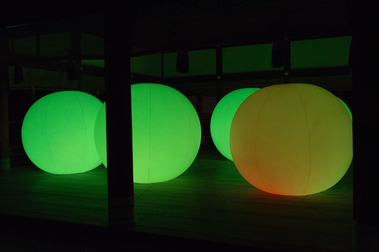 illuminated, green color, no people, lighting equipment, indoors, shape, geometric shape, circle, night, glowing, sphere, orange color, design, close-up, light, multi colored, nature, architecture, yellow, electric lamp