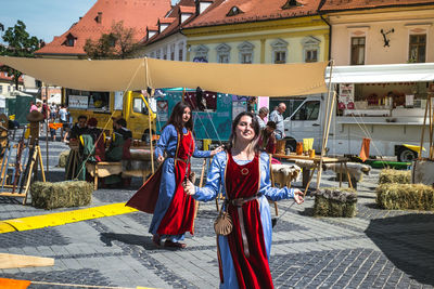 People on street in city