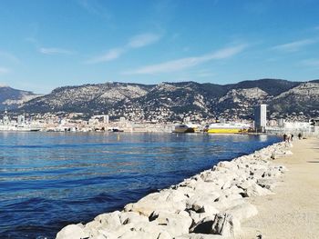 Scenic view of sea against blue sky