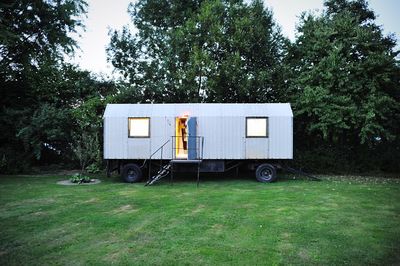 Cars parked on field