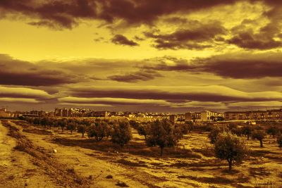 Scenic view of dramatic sky during sunset