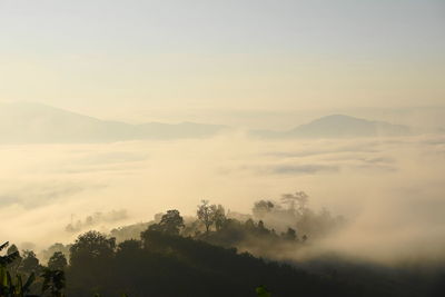 Scenic view of mountains against sky during sunset