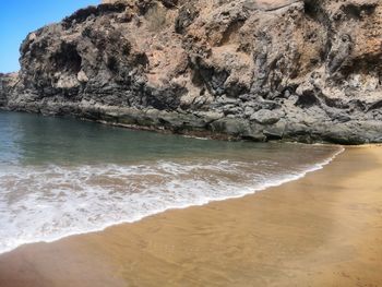 Scenic view of rocky beach