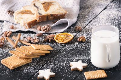 High angle view of cookies and coffee on table