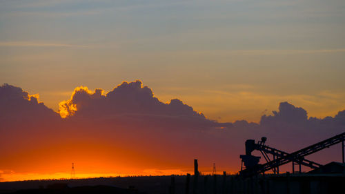 Silhouette of bridge against sky during sunset