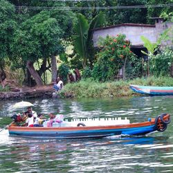 People floating on water in lake