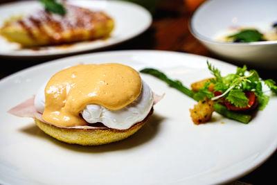 Egg breakfast food in the morning. poached dish. delicious meal plate tasty closeup on table. 