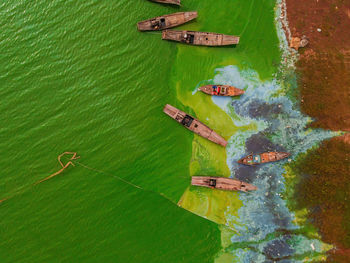 High angle view of people in boat on sea