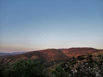 Scenic view of mountains against clear sky