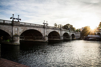 Arch bridge over river