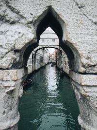 Arch bridge over water