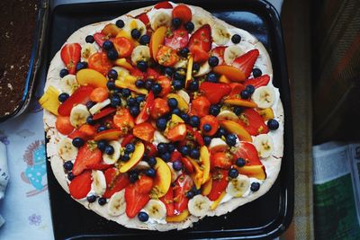 High angle view of fruits in plate on table