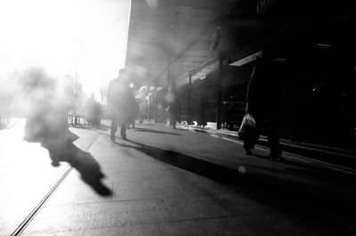 Woman walking on road