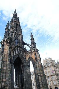 Low angle view of historic church against sky