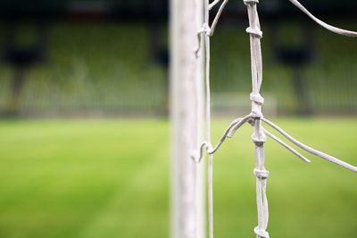 Close-up of goal post on soccer field