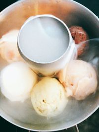 Close-up of hand holding ice cream