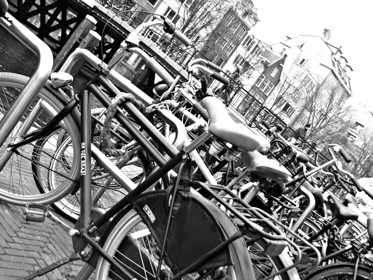 LOW ANGLE VIEW OF BICYCLE PARKED ON STREET