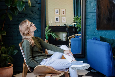 Woman sitting on the chair 