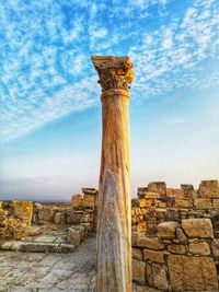 View of old ruins against cloudy sky