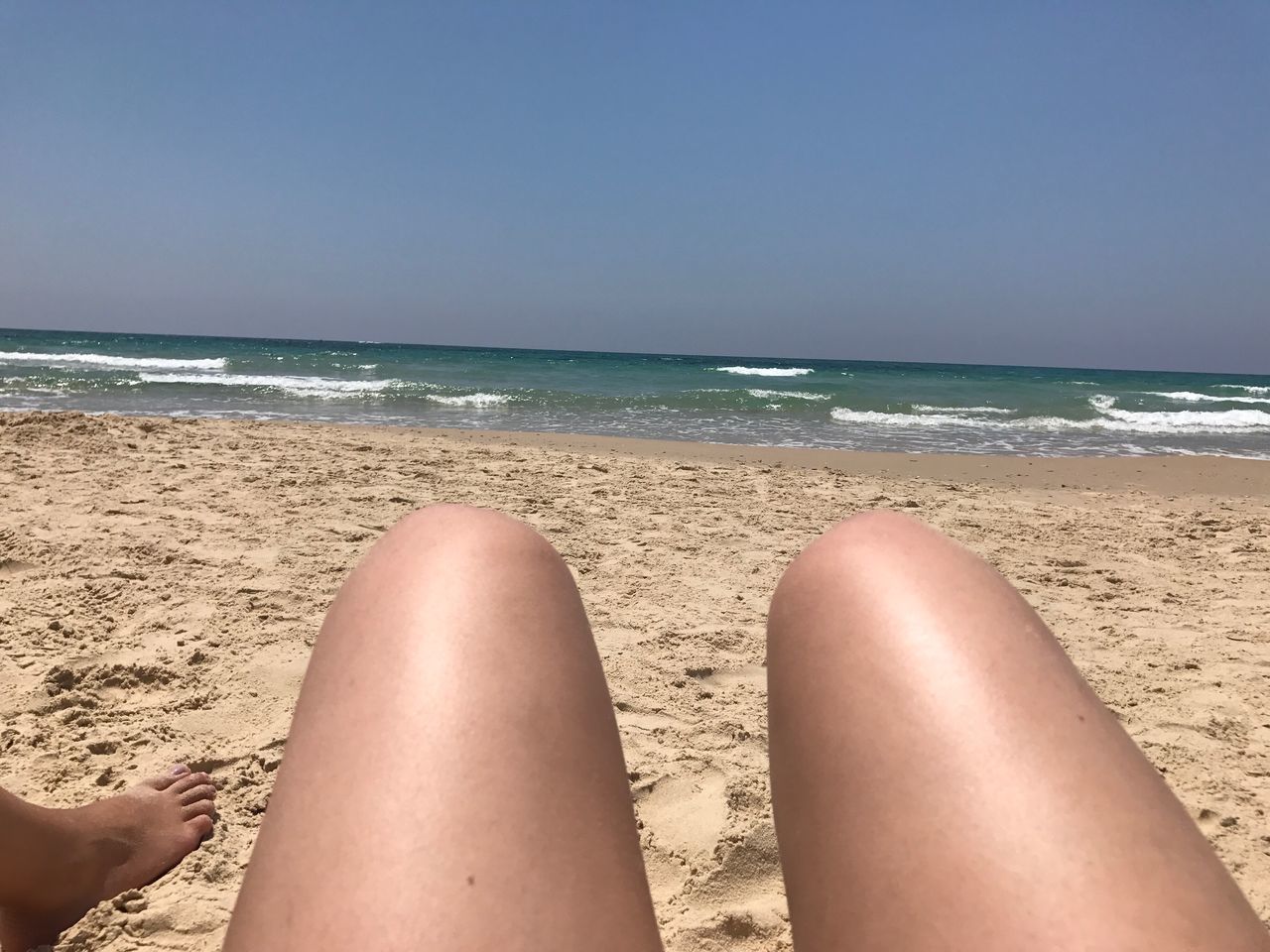 sea, beach, horizon over water, low section, water, human leg, one person, sand, beauty in nature, nature, sky, real people, day, human body part, outdoors, scenics, women, adult, people