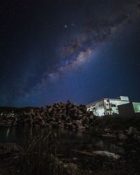 Low angle view of building against sky at night