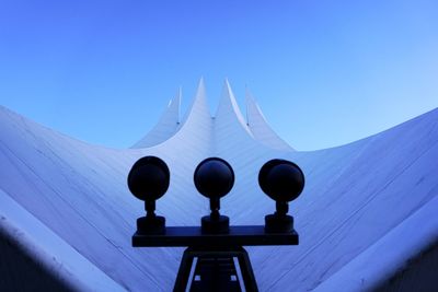 Low angle view of built structure against blue sky