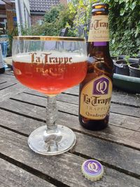 Close-up of beer glasses on table