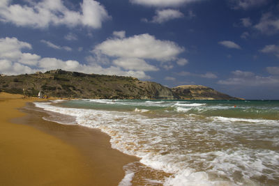 Scenic view of beach against sky