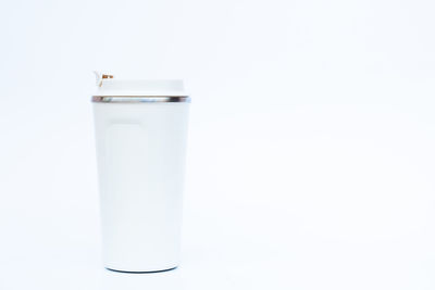 Close-up of drink against white background