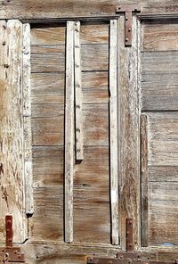 Full frame shot of old wooden door of building