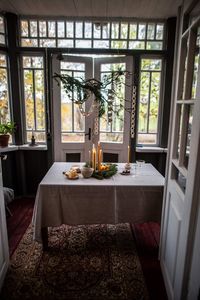 Glass table by window at home