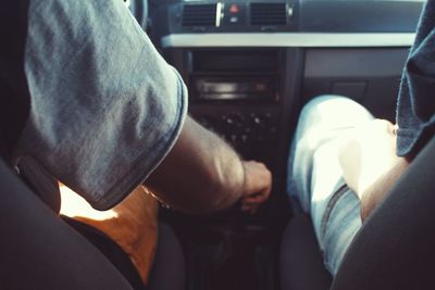 Close-up of man driving car