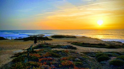 Scenic view of sea against sky during sunset