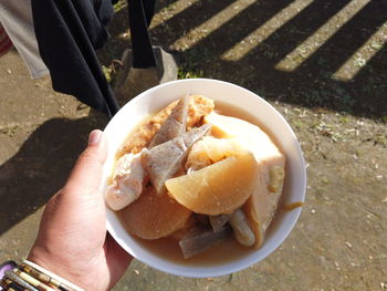 High angle view of person holding breakfast