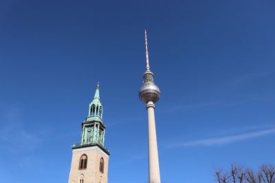 Low angle view of building against blue sky