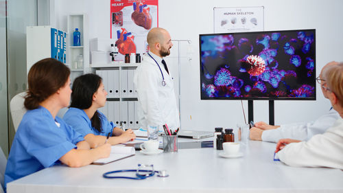 Female friends working at clinic