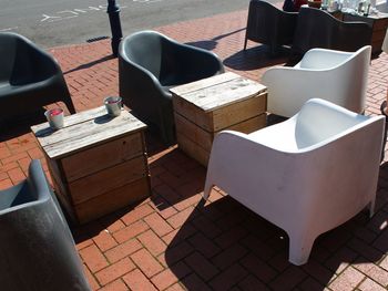 High angle view of empty chairs on table