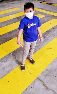 High angle view of boy on road