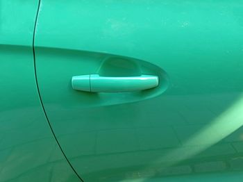 Full frame shot of green car door