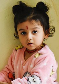 Portrait of cute girl at home