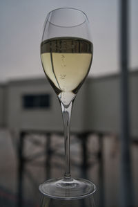 Close-up of wine in glass on table