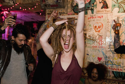 Young woman dancing at a club