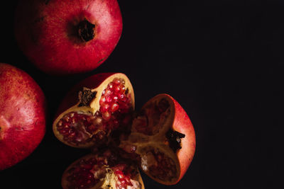 Close-up of apple against black background
