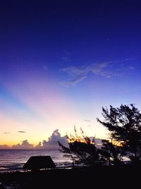 Built structure against sky at sunset