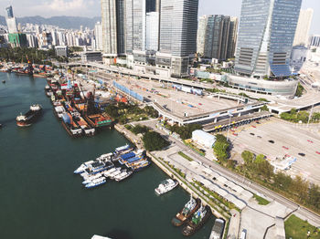 High angle view of harbor by buildings in city